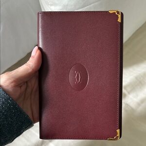 Authentic Cartier Burgundy leather case w/ Gold Accents. Pristine condition